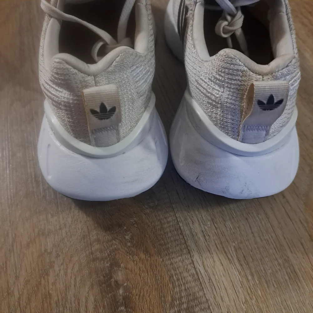 Adidas Kids' White Athletic Sneakers with Black Stripes